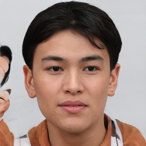Joyful asian young-adult male with short  brown hair and brown eyes