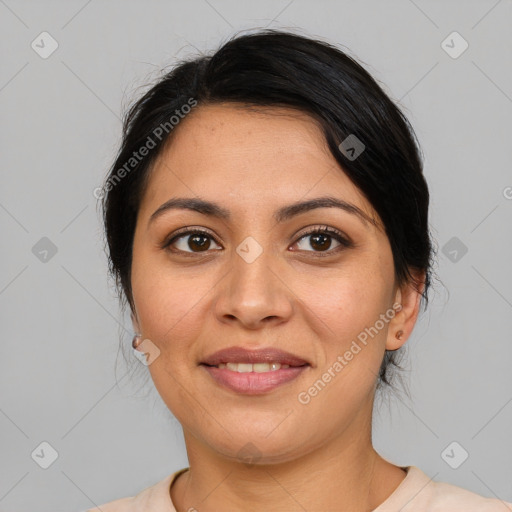 Joyful latino young-adult female with medium  black hair and brown eyes