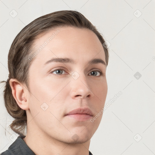 Neutral white young-adult male with short  brown hair and grey eyes