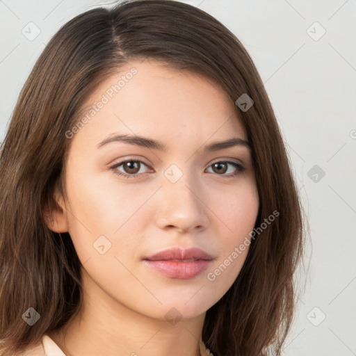 Neutral white young-adult female with long  brown hair and brown eyes