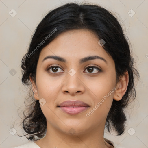 Joyful latino young-adult female with medium  brown hair and brown eyes