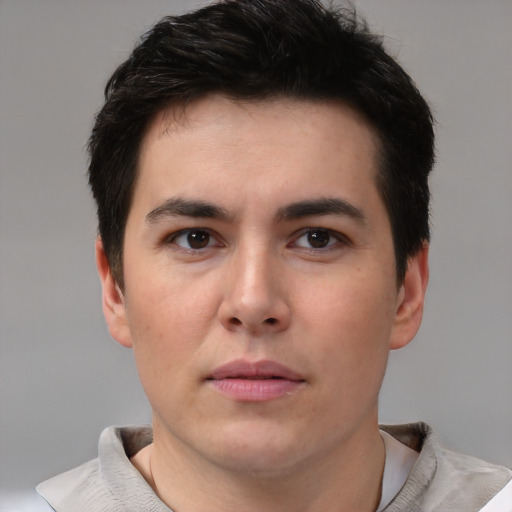 Neutral white young-adult male with short  brown hair and brown eyes