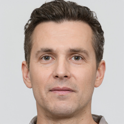 Neutral white adult male with short  brown hair and brown eyes