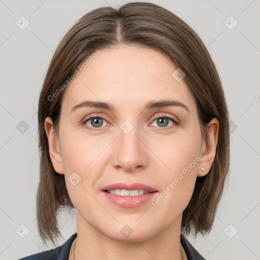 Joyful white young-adult female with medium  brown hair and grey eyes