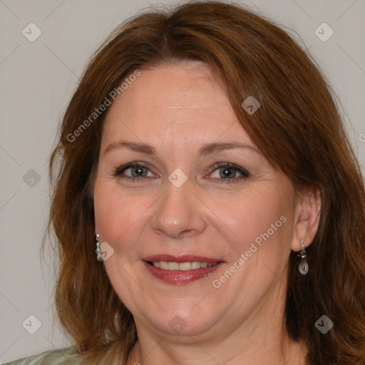 Joyful white adult female with medium  brown hair and brown eyes