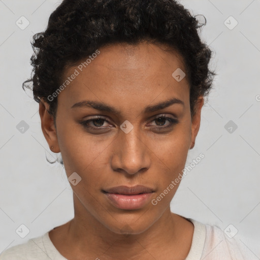 Neutral black young-adult female with short  brown hair and brown eyes