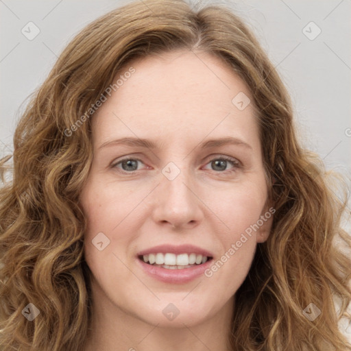 Joyful white young-adult female with long  brown hair and green eyes