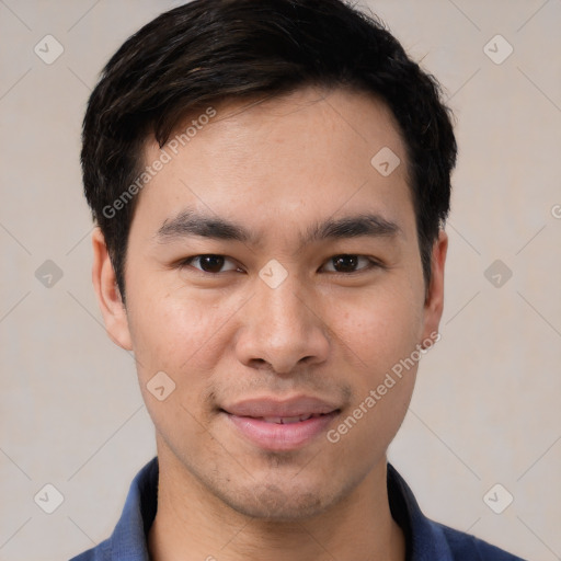 Joyful white young-adult male with short  black hair and brown eyes