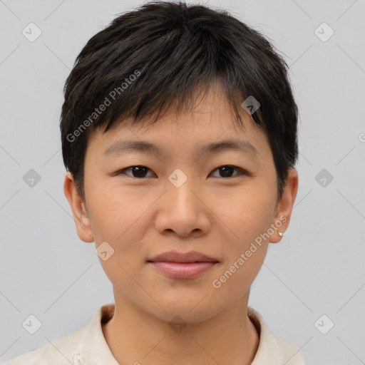 Joyful asian young-adult female with short  brown hair and brown eyes