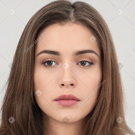 Neutral white young-adult female with long  brown hair and brown eyes