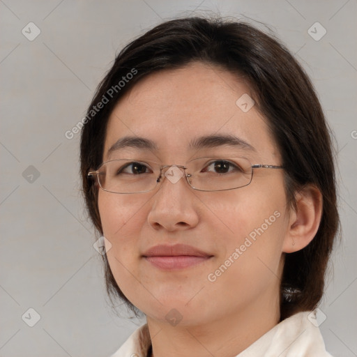 Joyful white adult female with medium  brown hair and brown eyes