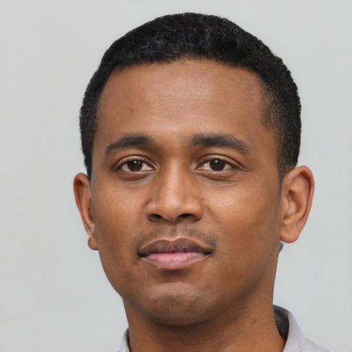 Neutral black young-adult male with short  black hair and brown eyes