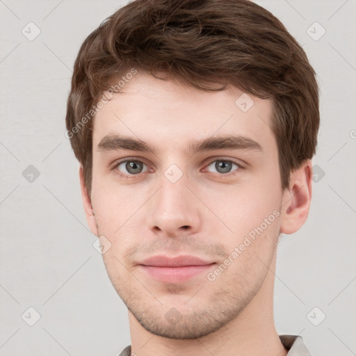 Neutral white young-adult male with short  brown hair and grey eyes