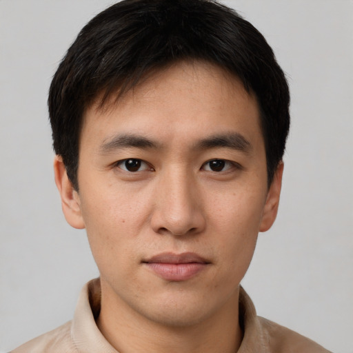 Neutral asian young-adult male with short  brown hair and brown eyes