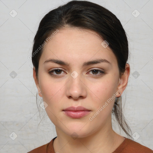 Neutral white young-adult female with medium  brown hair and brown eyes