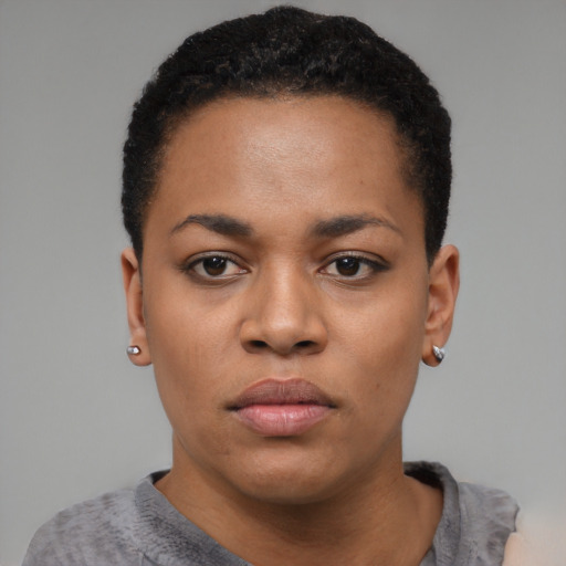 Neutral black young-adult female with short  black hair and brown eyes