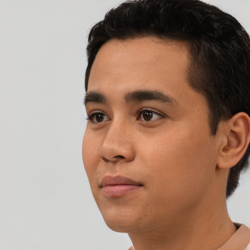 Neutral asian young-adult male with short  black hair and brown eyes