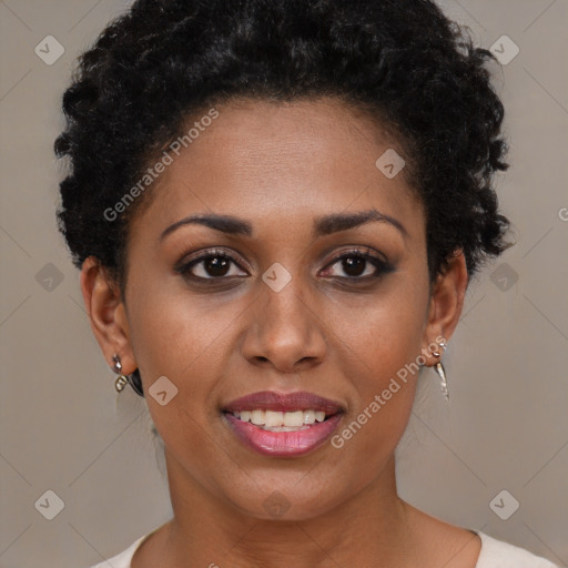 Joyful black young-adult female with short  brown hair and brown eyes