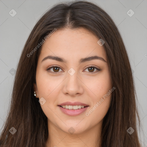 Joyful white young-adult female with long  brown hair and brown eyes