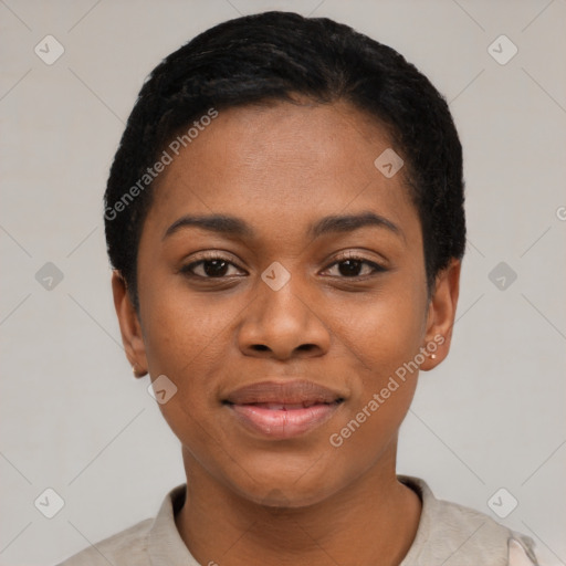 Joyful black young-adult female with short  black hair and brown eyes