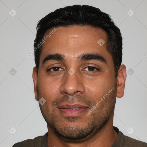 Neutral white young-adult male with short  black hair and brown eyes
