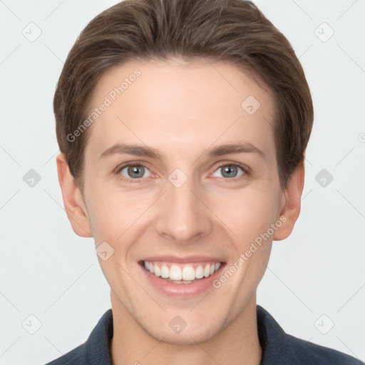 Joyful white young-adult female with short  brown hair and grey eyes