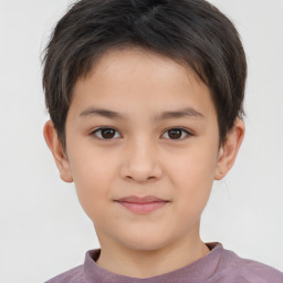 Joyful white child male with short  brown hair and brown eyes