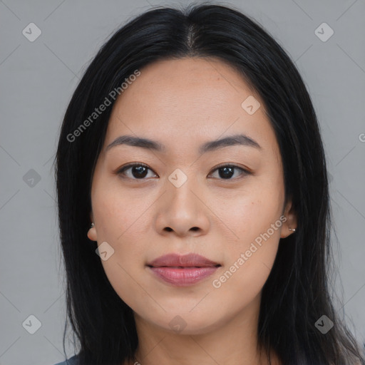 Joyful asian young-adult female with long  black hair and brown eyes