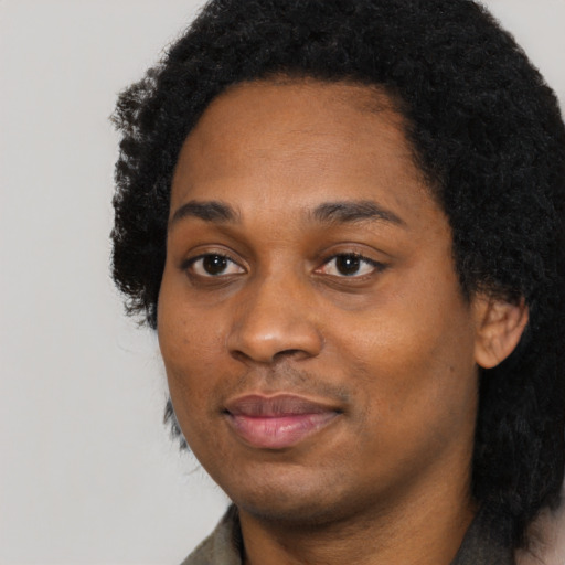 Neutral black young-adult female with short  black hair and brown eyes
