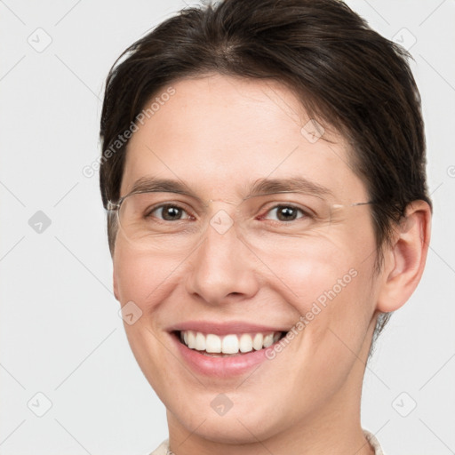 Joyful white adult female with medium  brown hair and grey eyes