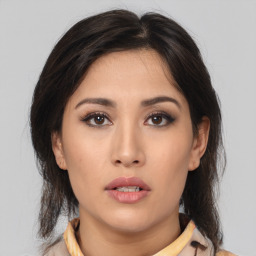 Neutral asian young-adult female with medium  brown hair and brown eyes