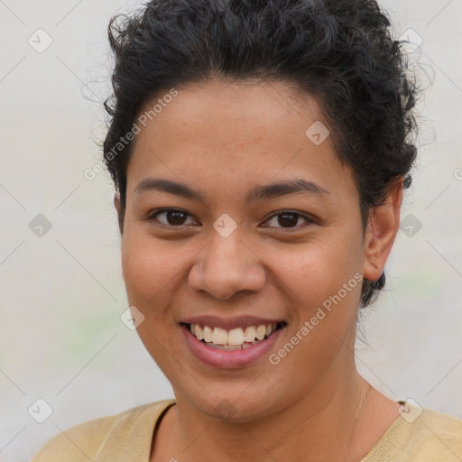 Joyful latino young-adult female with short  brown hair and brown eyes