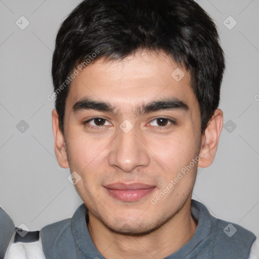 Joyful white young-adult male with short  black hair and brown eyes