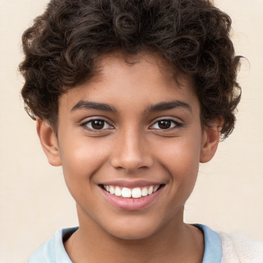 Joyful white child male with short  brown hair and brown eyes