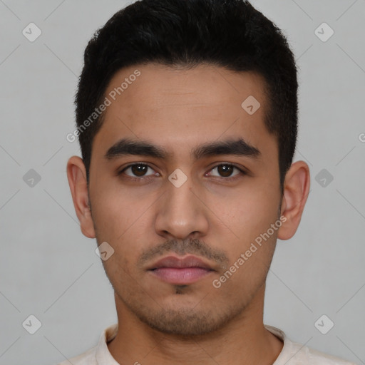 Neutral latino young-adult male with short  black hair and brown eyes