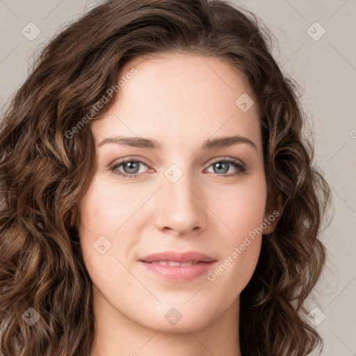 Joyful white young-adult female with long  brown hair and green eyes