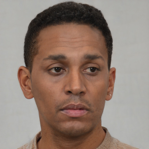 Neutral black young-adult male with short  brown hair and brown eyes