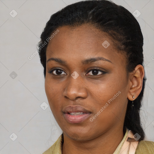 Joyful black young-adult female with medium  brown hair and brown eyes