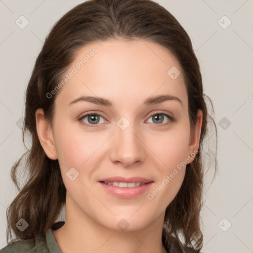 Joyful white young-adult female with medium  brown hair and grey eyes