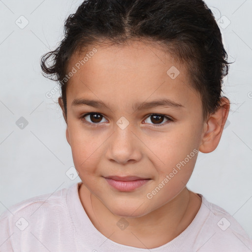 Joyful white child female with short  brown hair and brown eyes