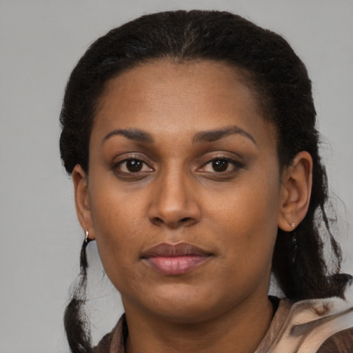 Neutral latino young-adult female with short  black hair and brown eyes