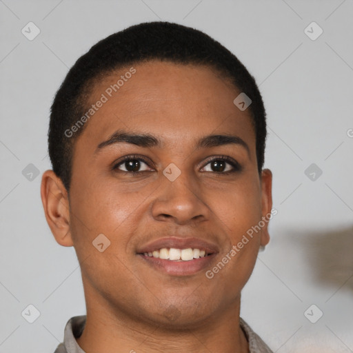 Joyful latino young-adult male with short  brown hair and brown eyes