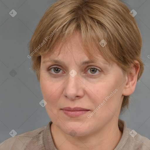 Joyful white adult female with medium  brown hair and brown eyes