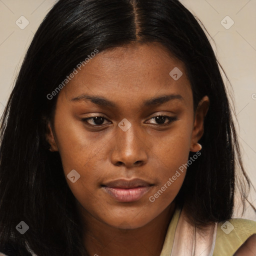 Joyful black young-adult female with long  brown hair and brown eyes