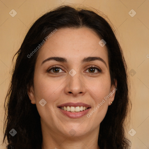 Joyful white adult female with long  brown hair and brown eyes