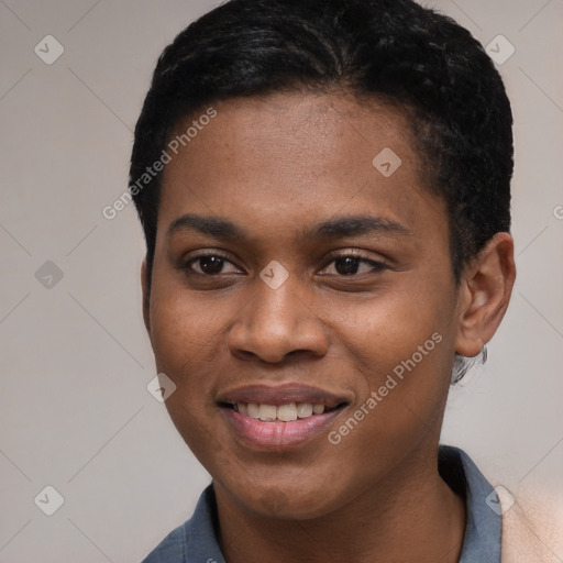 Joyful black young-adult female with short  black hair and brown eyes