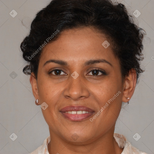 Joyful latino adult female with medium  brown hair and brown eyes