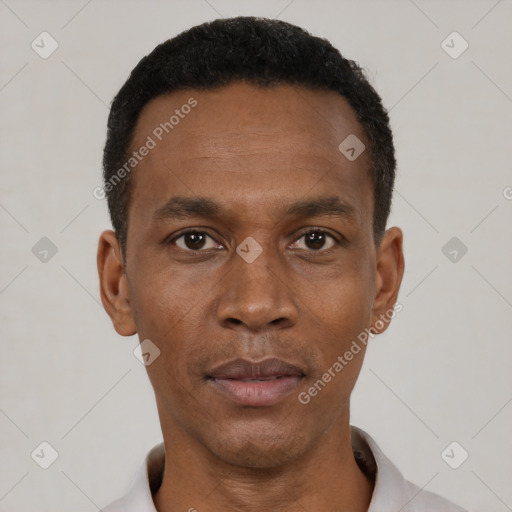 Neutral black young-adult male with short  black hair and brown eyes