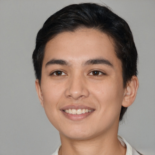 Joyful white young-adult male with short  brown hair and brown eyes