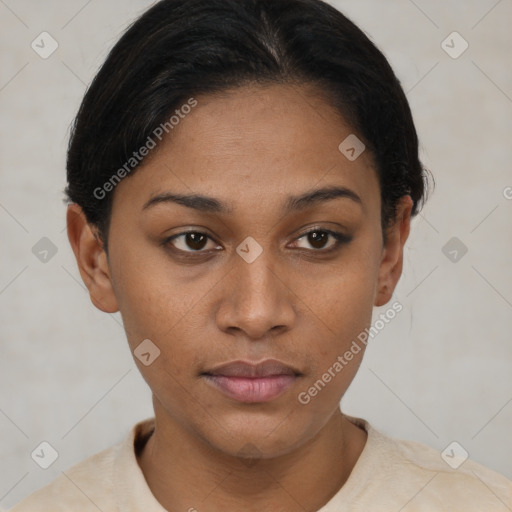 Joyful latino young-adult female with short  brown hair and brown eyes